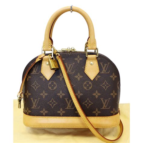 beige louis vuitton bag|Louis Vuitton alma bb bag.